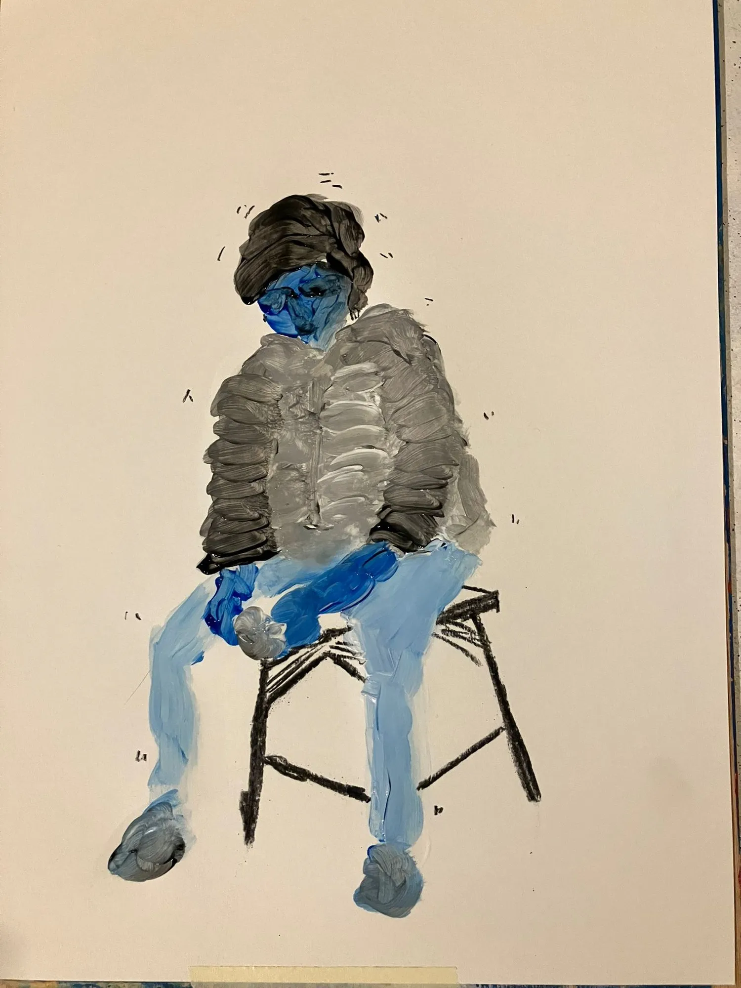 Seated figure on a stool in blue and grey