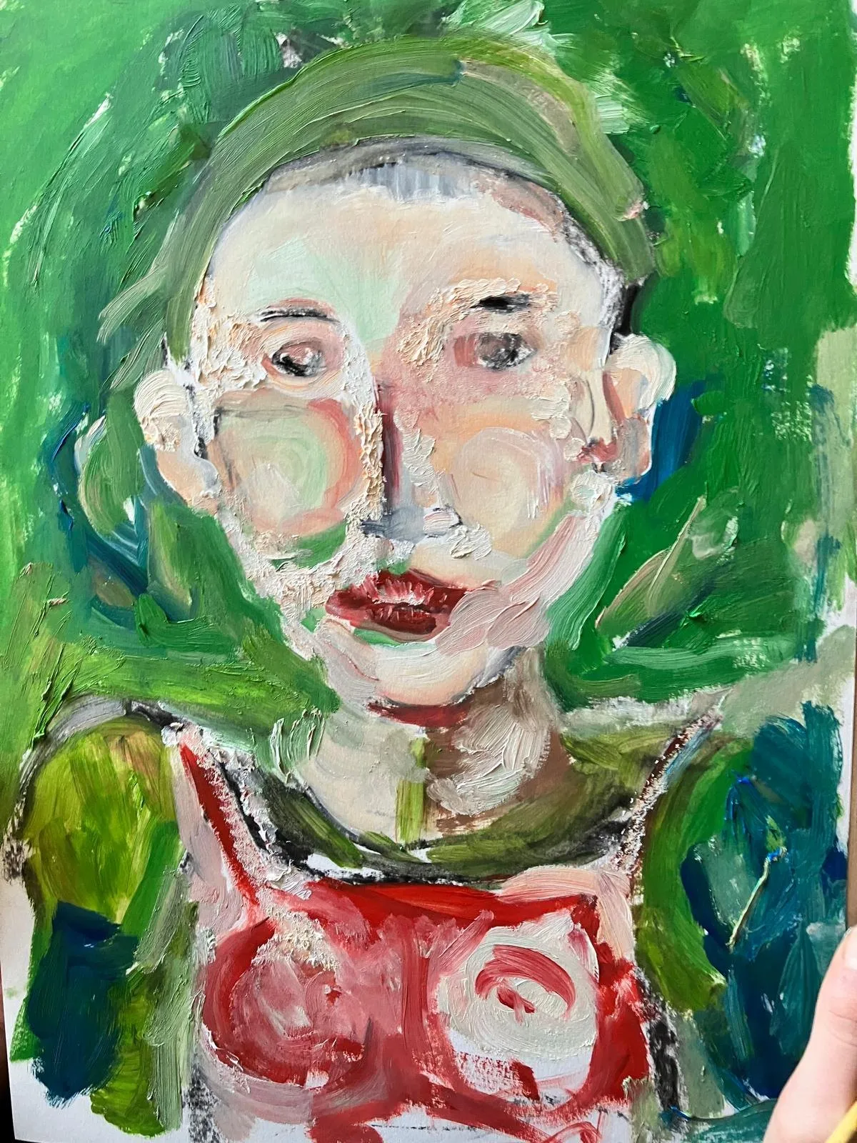 Portrait in green with red