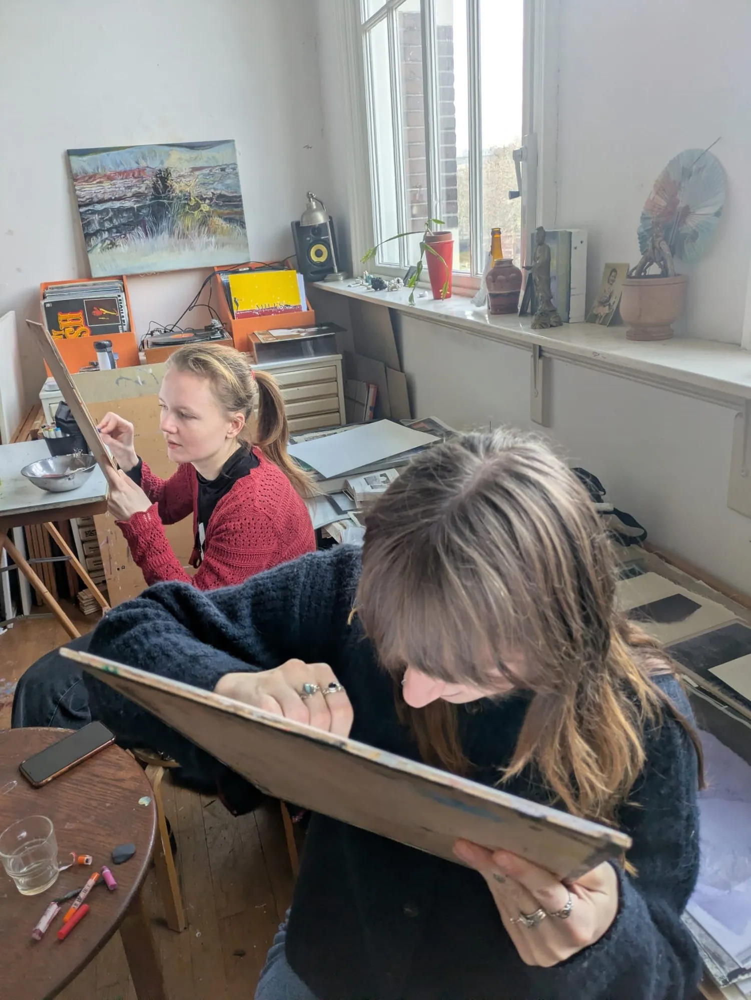 Two participants at work in the atelier