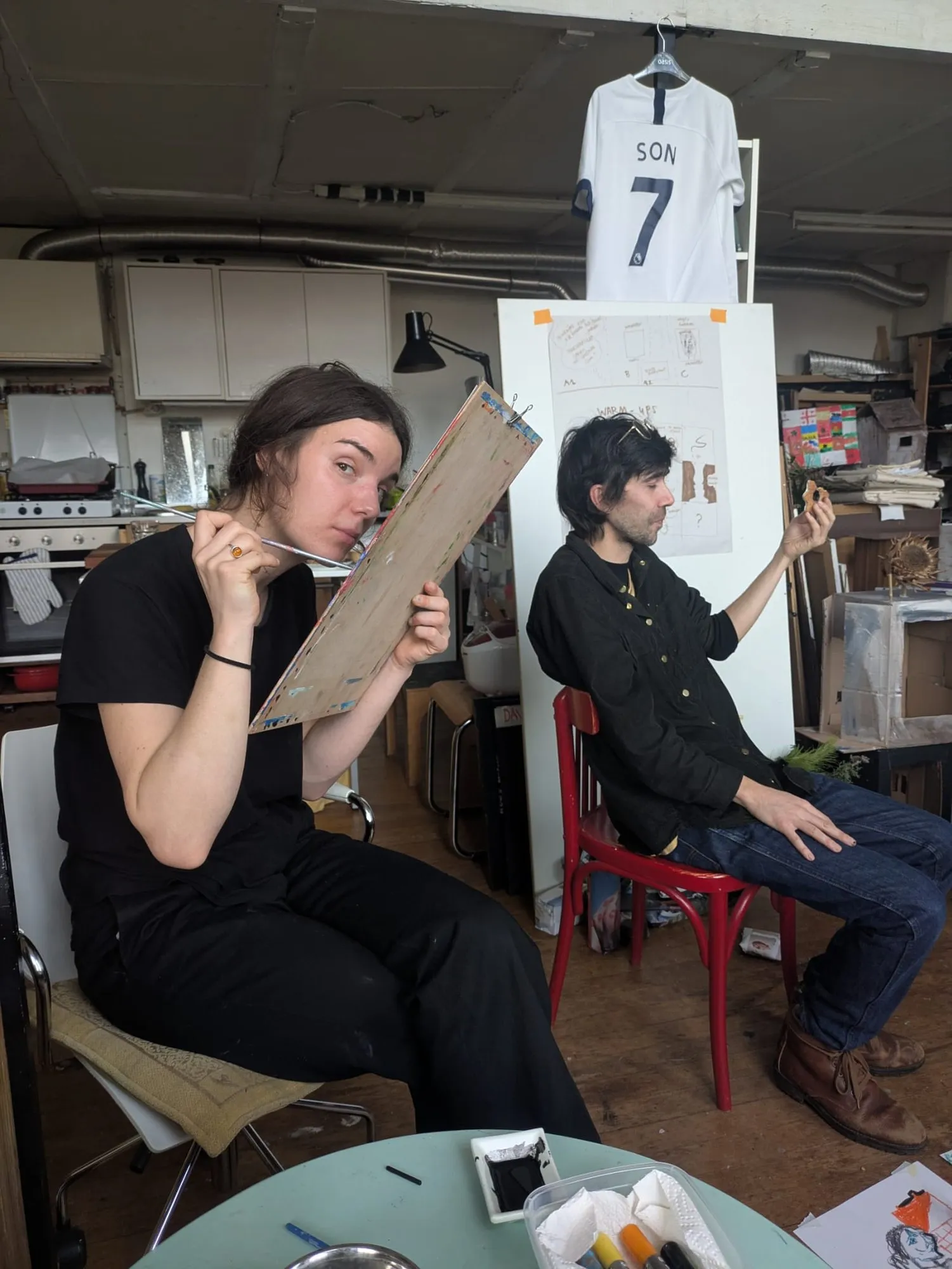 Two participants at work in the atelier