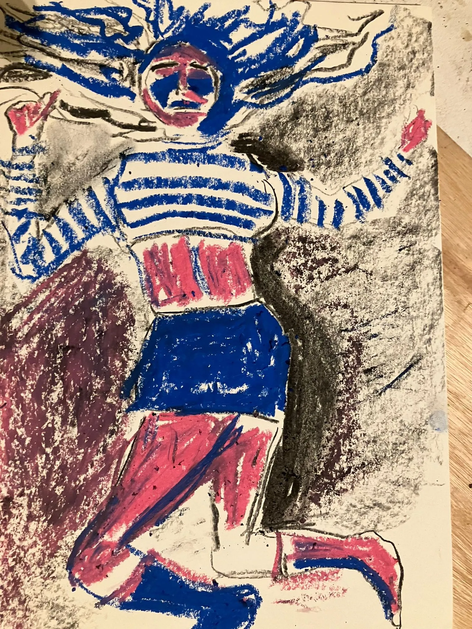 Figure in a striped shirt on blue